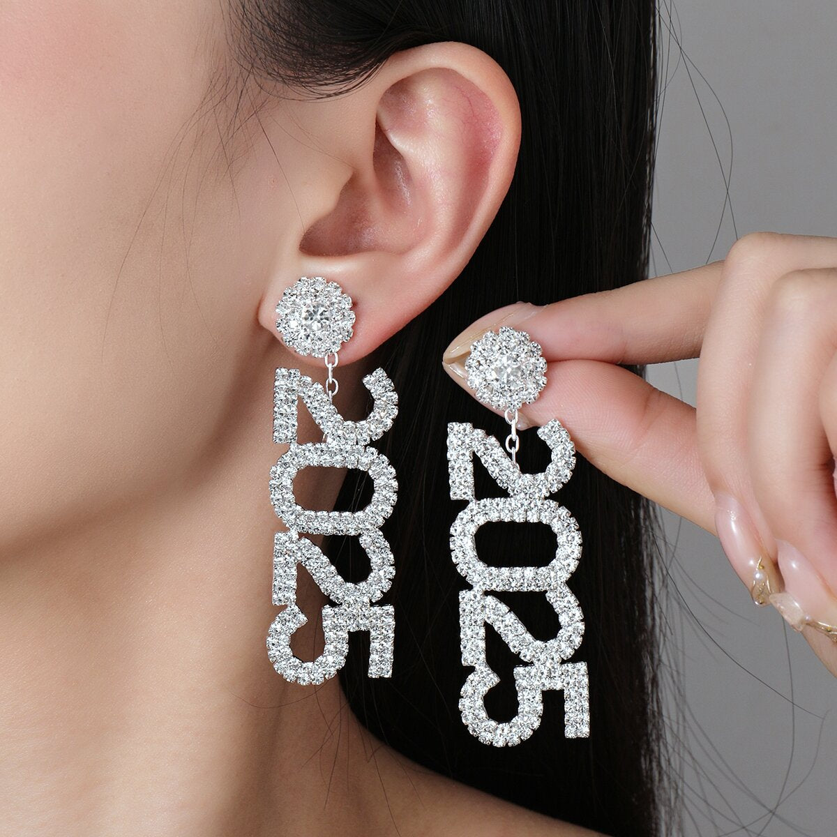 Boucle d'oreille femme | 2025